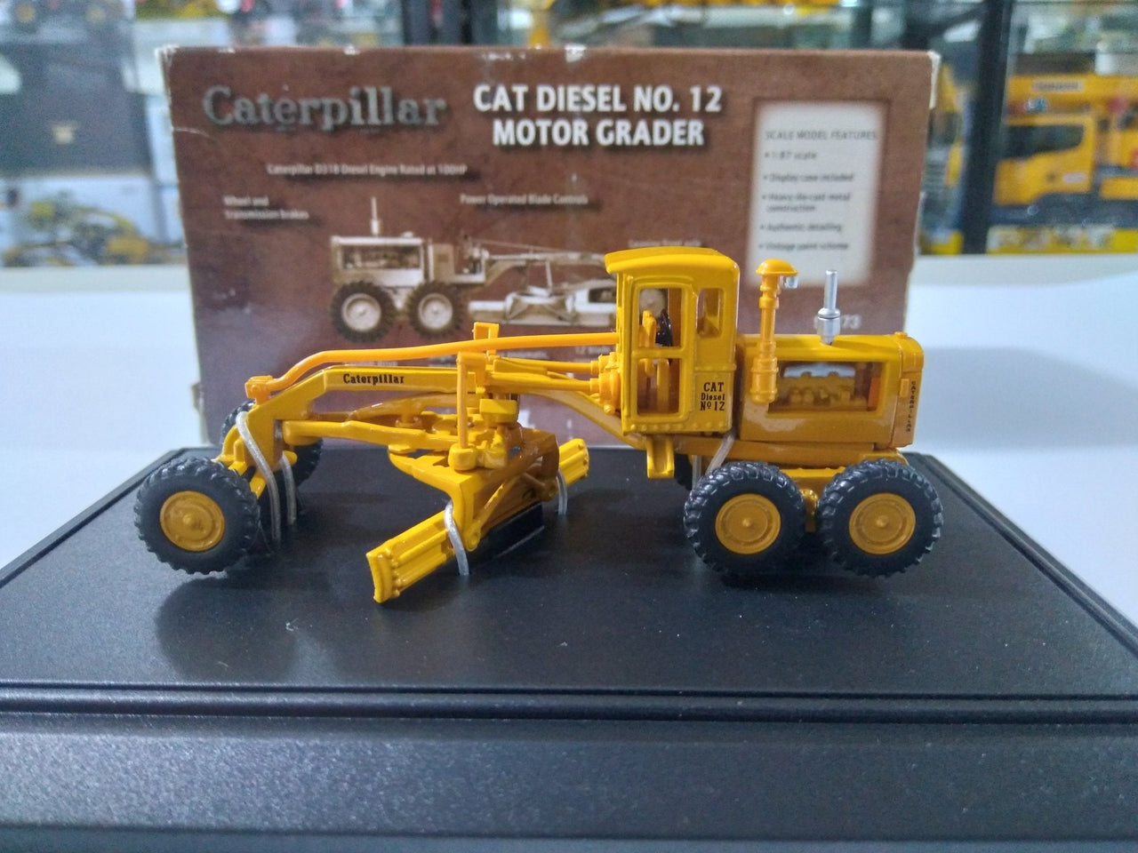 55173-LQ Motoniveladora Caterpillar Diesel 12 Escala 1:87