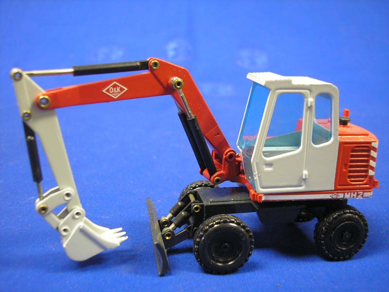 287 O&amp;K MH2 Wheeled Excavator 1:50 Scale (Discontinued Model)
