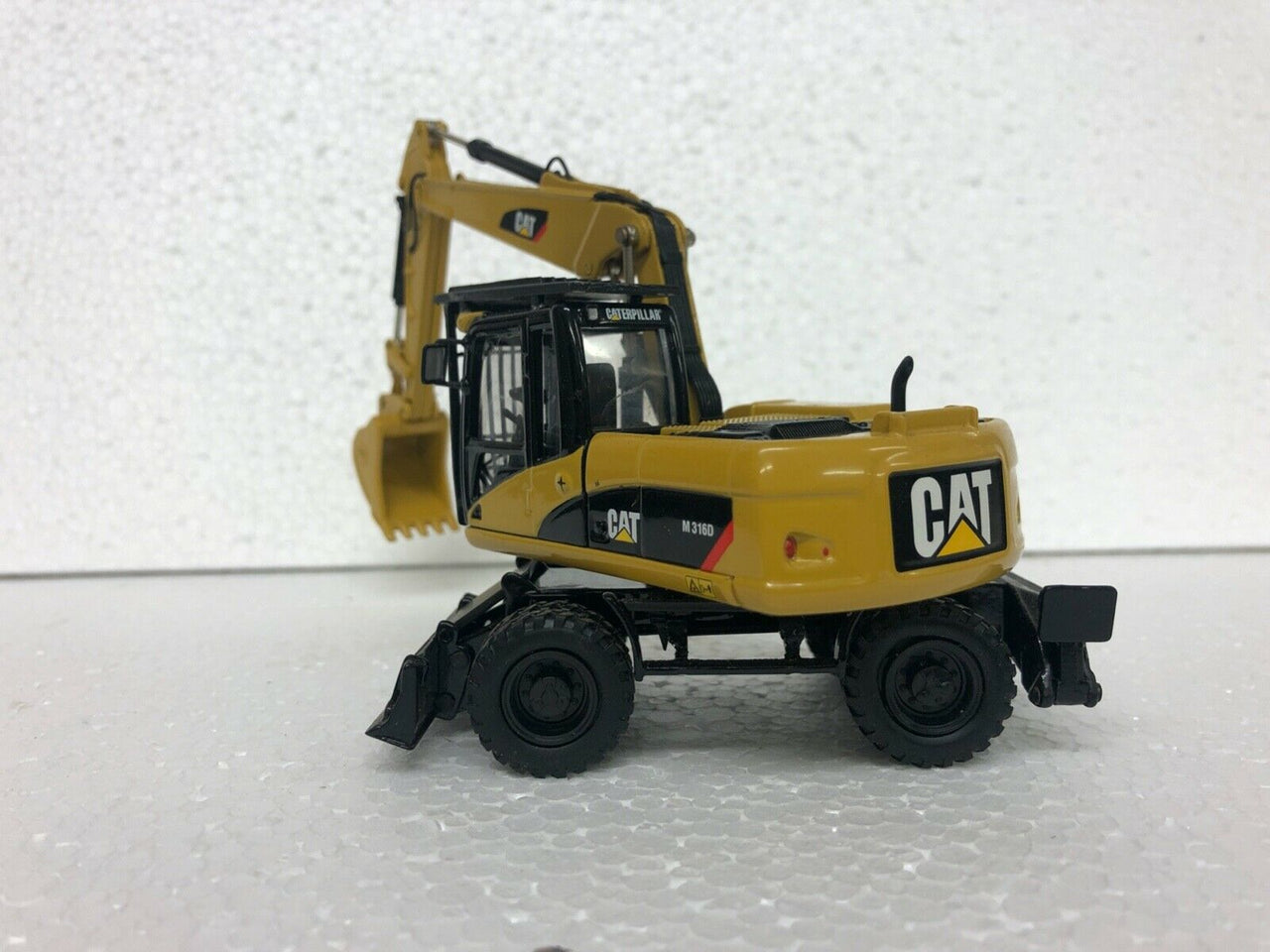 55171 Caterpillar M316D Wheeled Excavator Scale 1:50 (Discontinued Model)