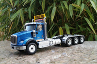 Thumbnail for 71010 Tracto Camión Tridem International HX620 Azul Escala 1:50